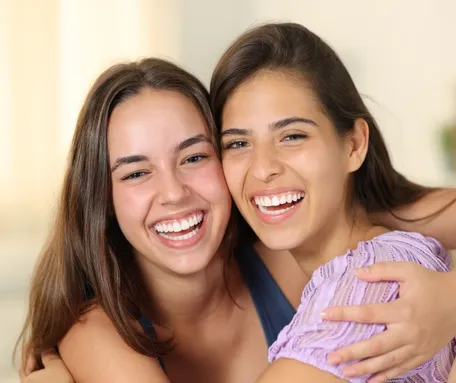 Patient smiling and talking on phone